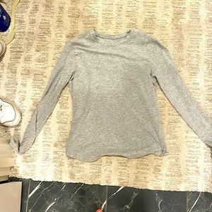 A old gray long sleeve wanting to be bought so please by me